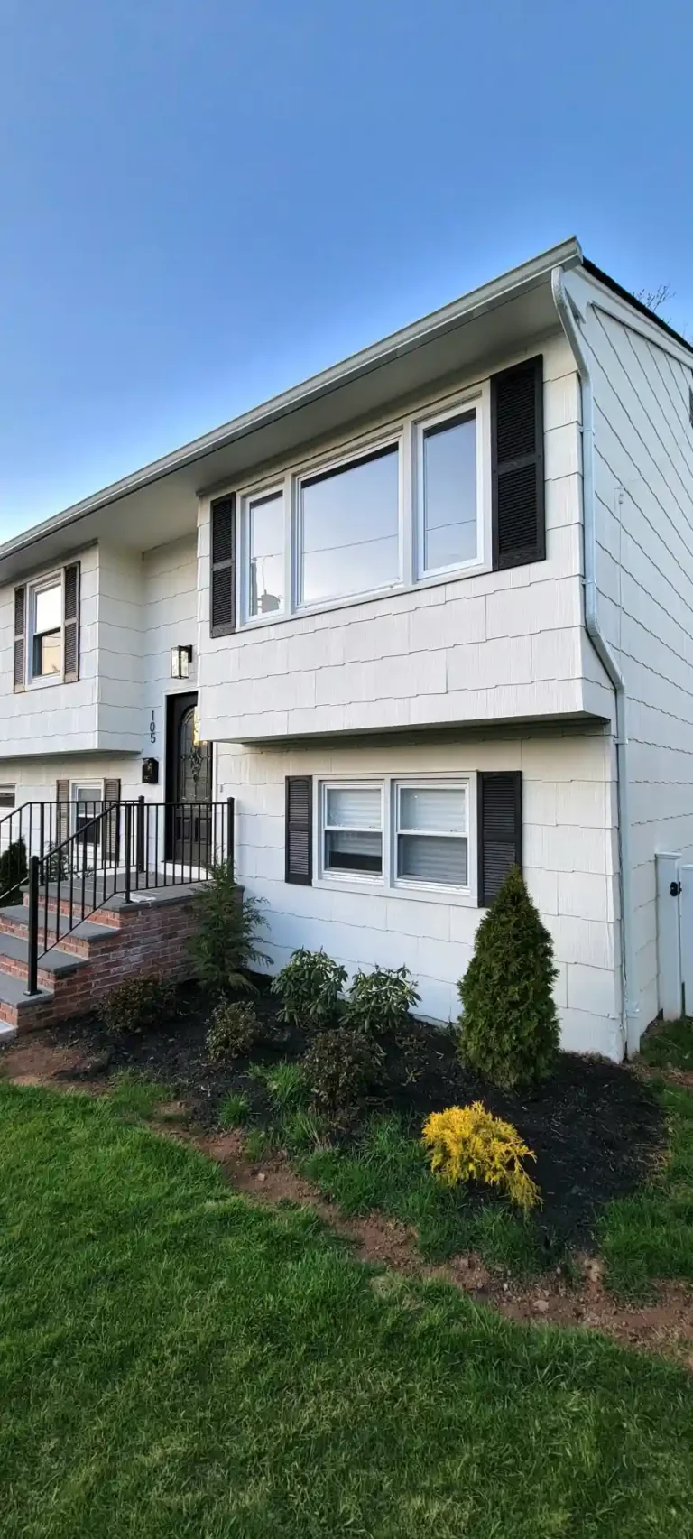 Exterior-House-painting-white-Asbestos-siding-black-shutters-1